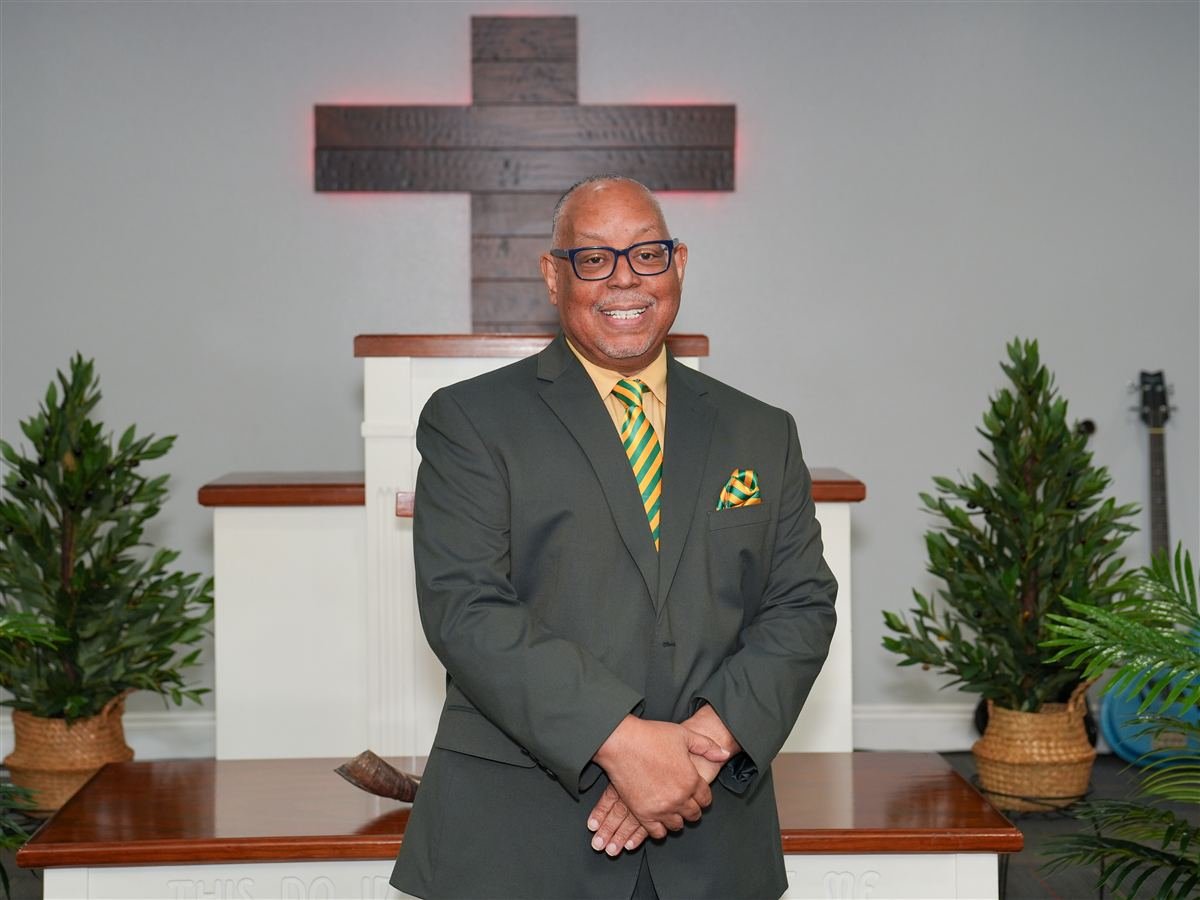 Minister Eric Mitchell, Sunday School Director, at the altar of Deliverance Baptist Church in Marianna, Florida
